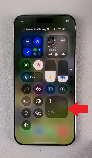 How To Turn ON Flashlight On iPhone 16 / 16 Pro via Control Center