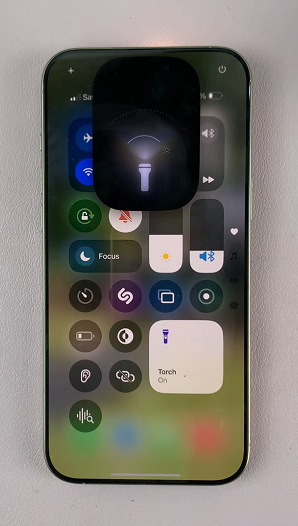 Turn ON Flashlight On iPhone 16 / 16 Pro via Control Center